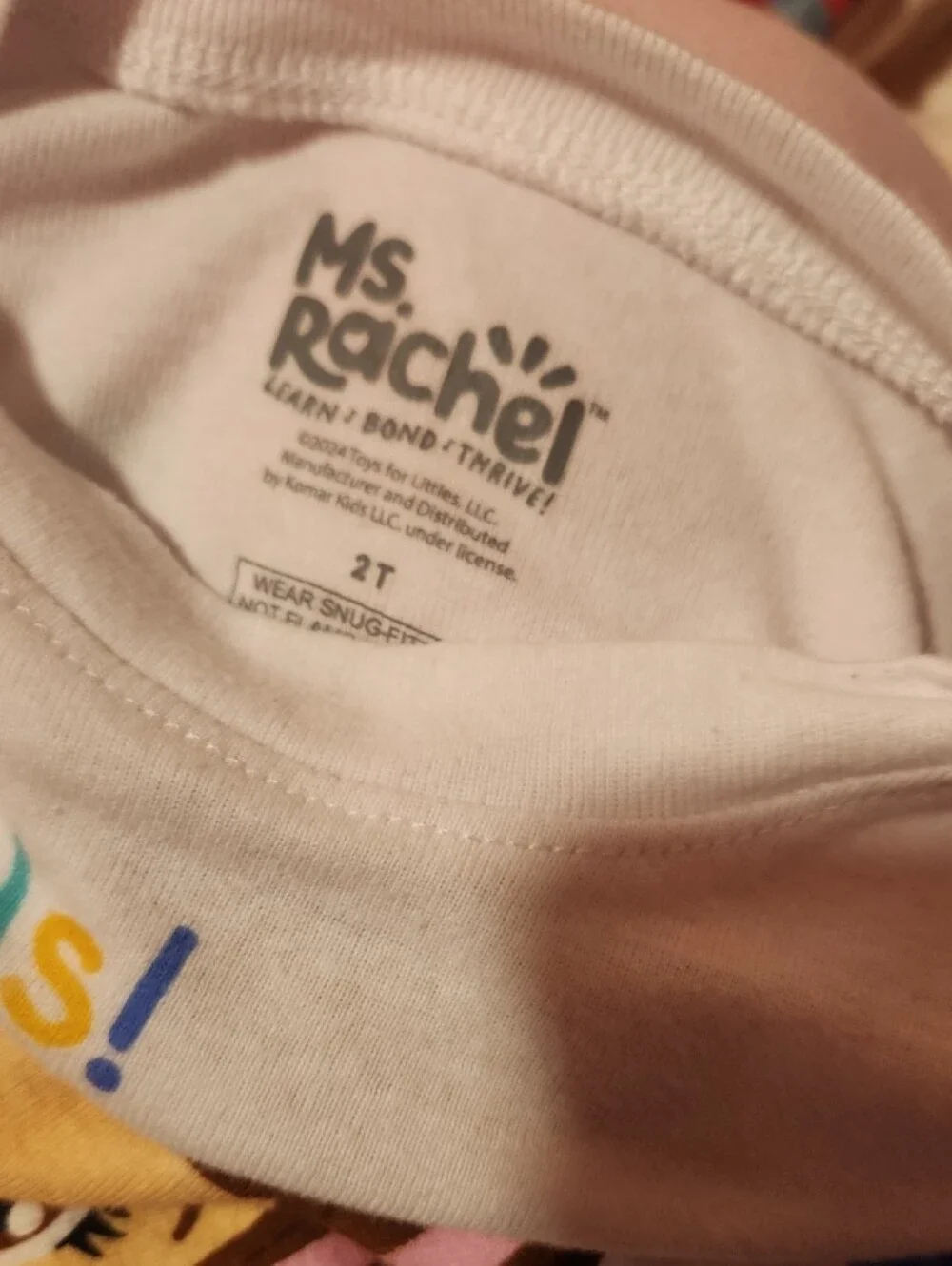Girls' White Pajama Set with Colorful Stripes and Character Graphic